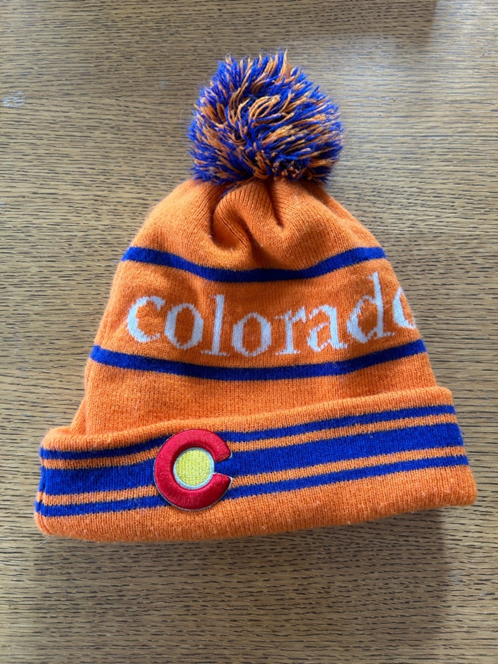 Colorado Pom Beanie - Orange & Blue